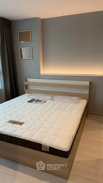 Modern bedroom with stylish lighting and minimalist decor