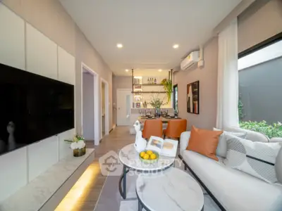 Luxurious modern living room with stylish decor and natural light