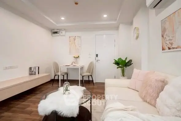 Chic and cozy living room with modern decor and plush seating