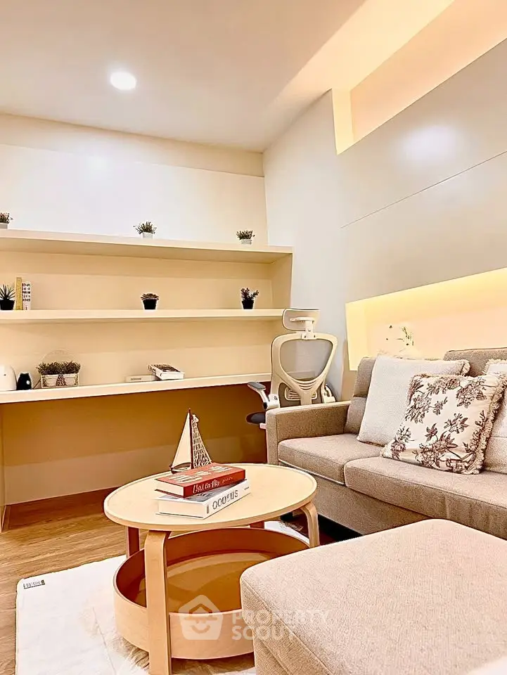 Modern living room with stylish furniture and cozy lighting, perfect for relaxation and entertaining.