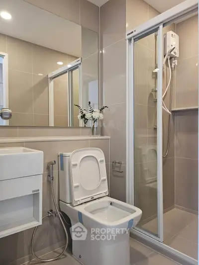 Modern bathroom with sleek design and glass shower enclosure