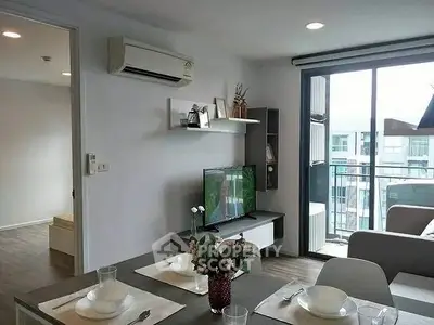 Modern living room with balcony view and stylish decor