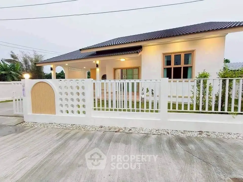 Charming single-story home with modern design and spacious front yard