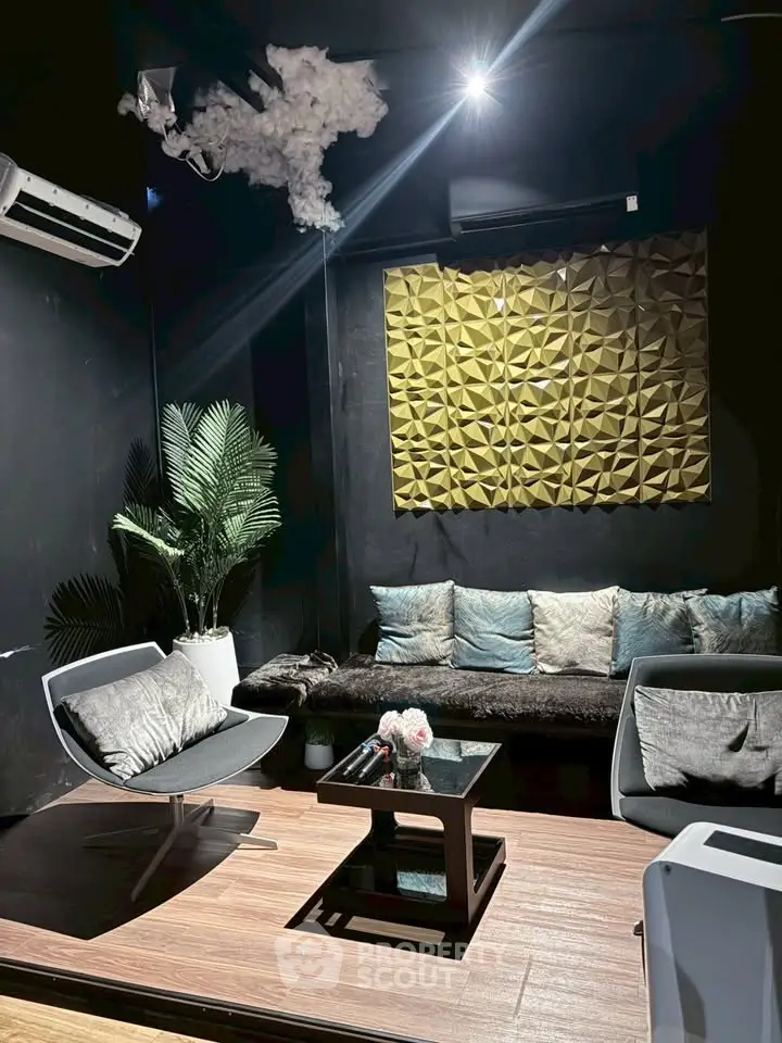 Stylish modern living room with sleek furniture and unique wall decor