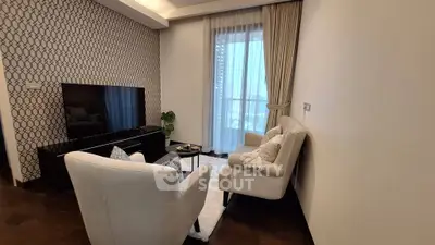 Elegant living room with modern decor and large window view