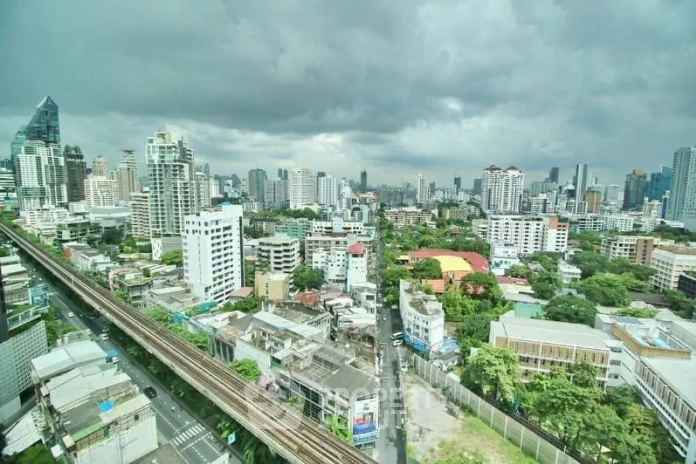 Stunning cityscape view showcasing urban skyline and lush greenery.
