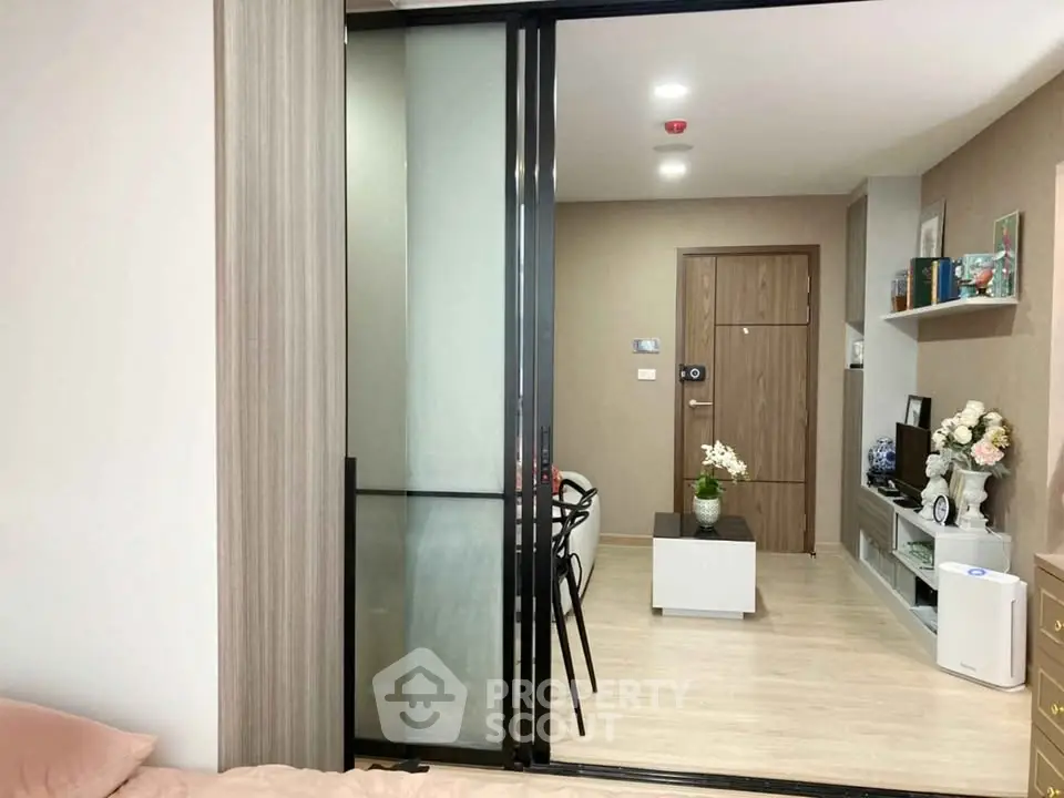 Modern apartment interior with sliding glass doors and stylish decor