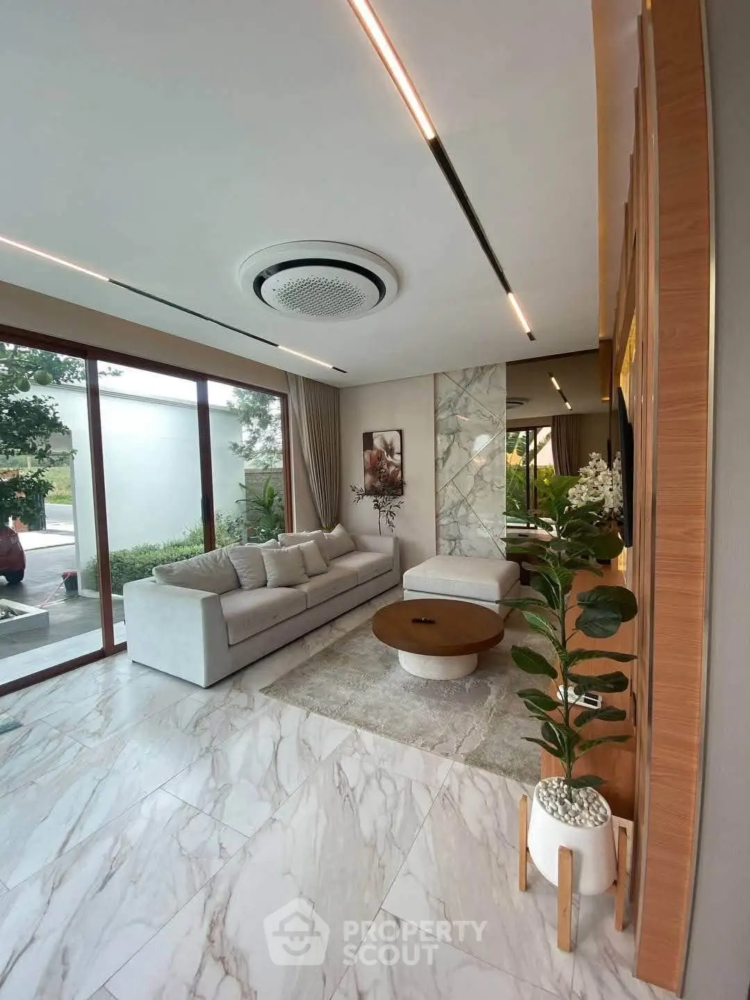 Luxurious modern living room with marble flooring and elegant decor