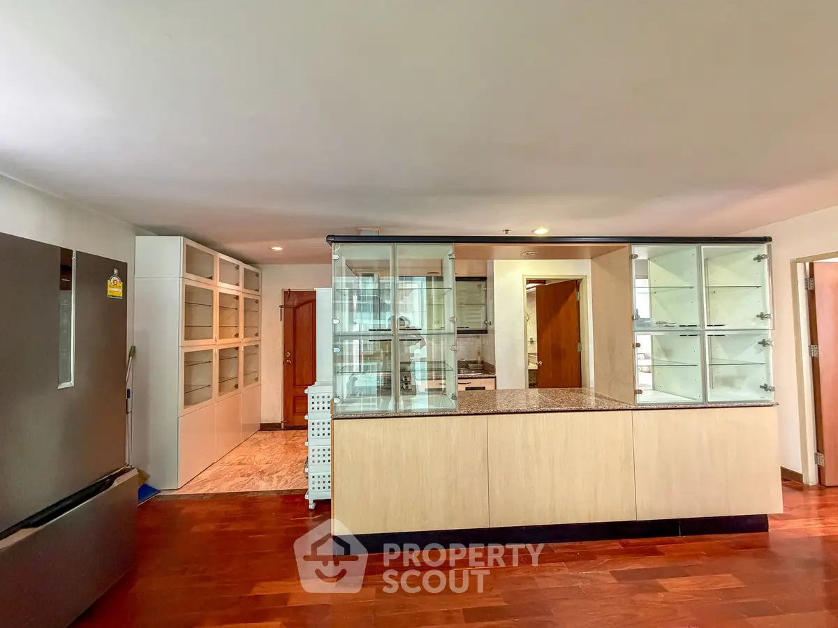 Spacious kitchen with modern appliances and ample storage space