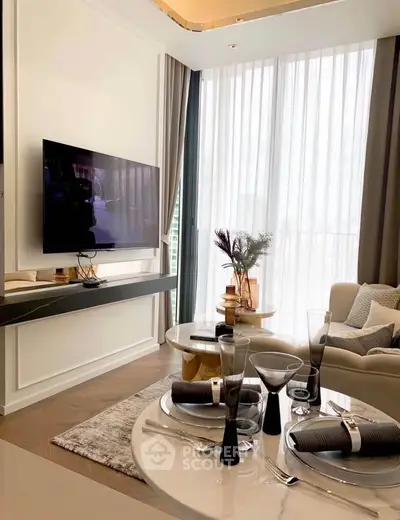 Luxurious modern living room with elegant decor and large TV, perfect for stylish urban living.