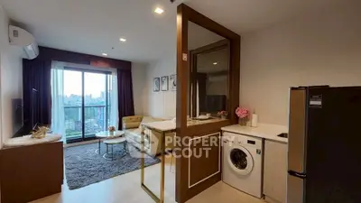 Modern open-layout living room with washing machine and balcony view