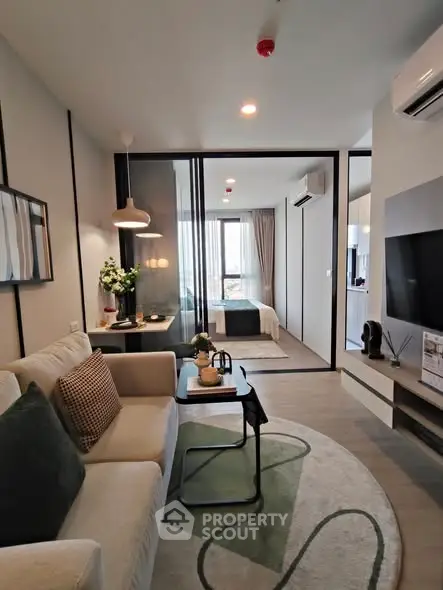 Modern living room with stylish decor and open layout in a contemporary apartment.