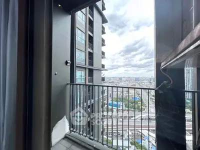 Stunning urban balcony with panoramic city view in modern high-rise building