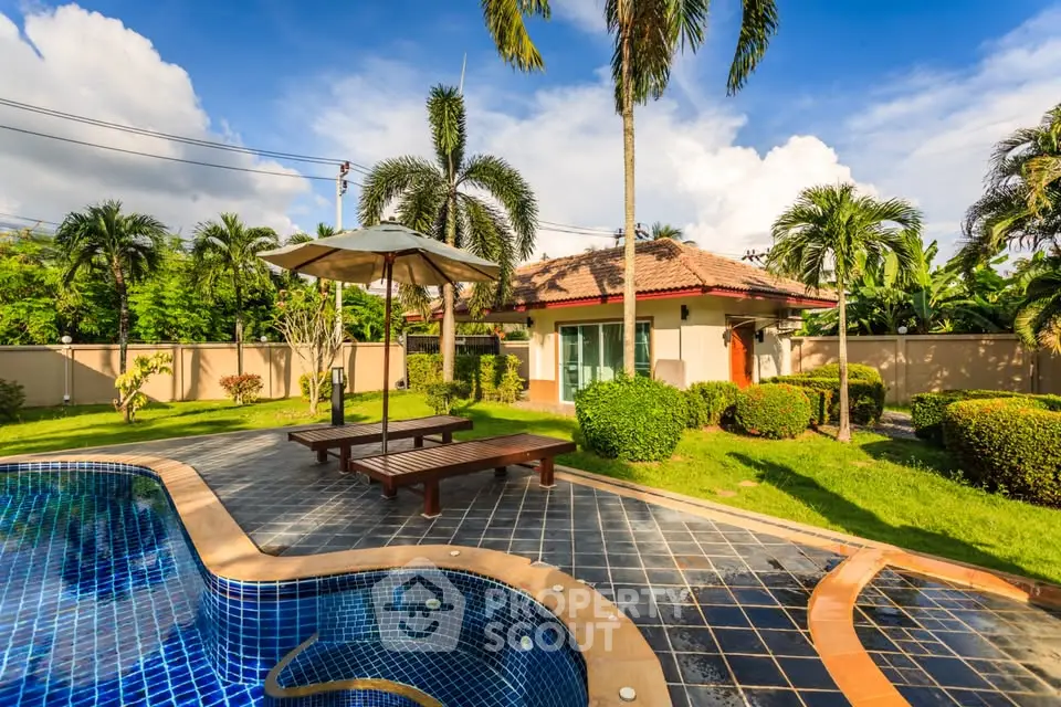 Stunning tropical villa with private pool and lush garden, perfect for luxurious outdoor living.