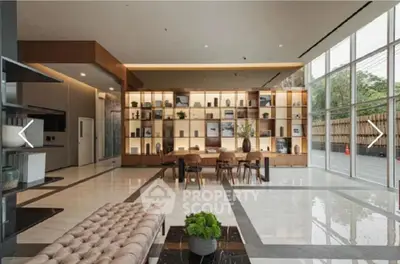 Luxurious modern living room with elegant decor and floor-to-ceiling windows