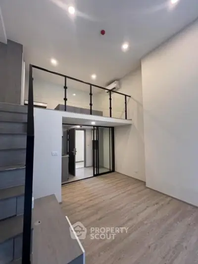 Modern loft apartment with mezzanine and sleek design