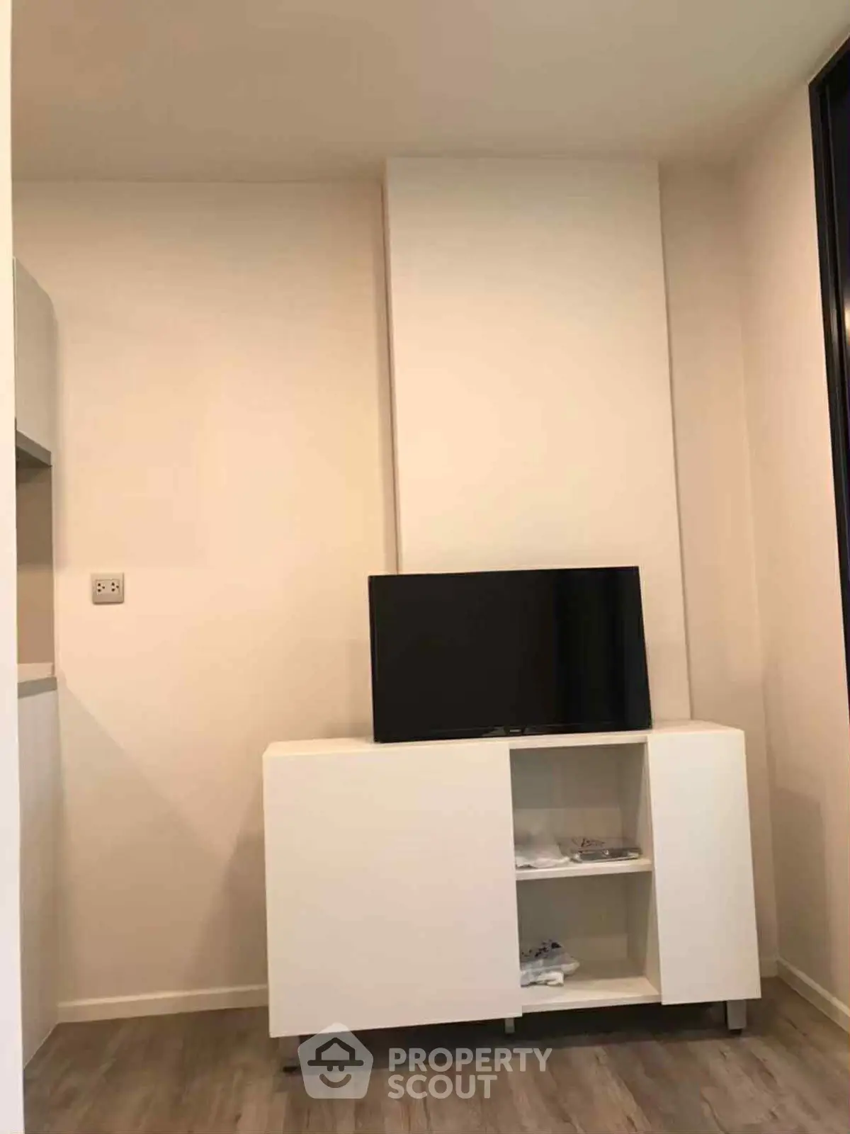 Modern living room with sleek TV stand and minimalist decor