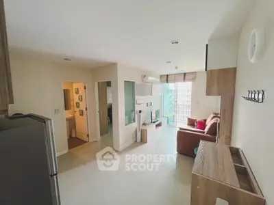 Modern apartment interior with open layout and balcony view