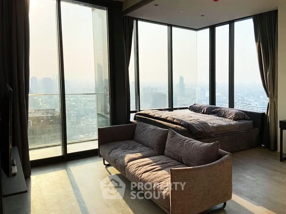Luxurious corner unit with panoramic city views and stylish interior design.