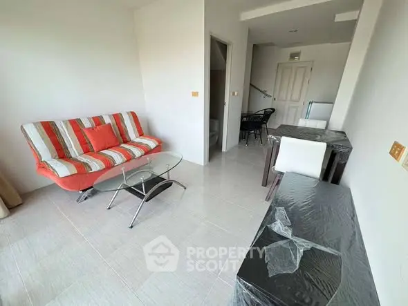 Modern living room with stylish furniture and natural light