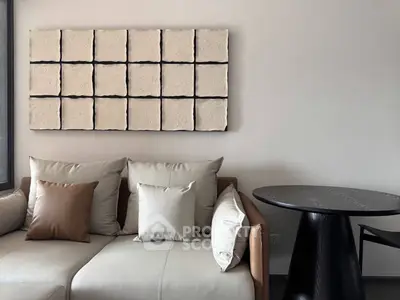 Modern living room with stylish sofa and unique wall art