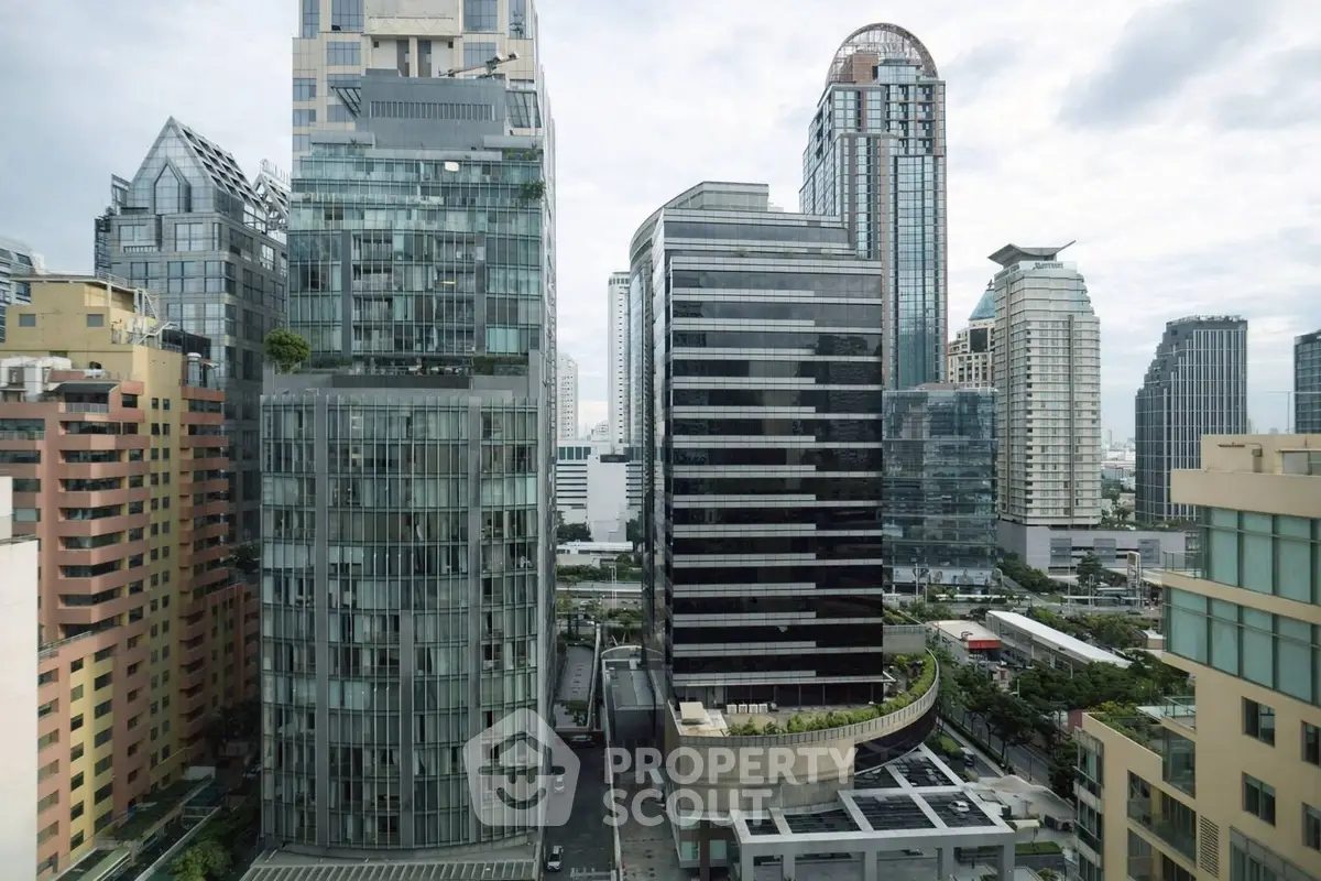 Stunning urban skyline with modern high-rise buildings and lush greenery.