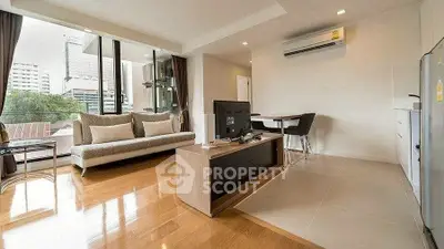 Spacious modern living room with city view and elegant furnishings.