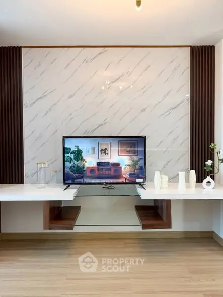 Modern living room with stylish TV setup and elegant decor