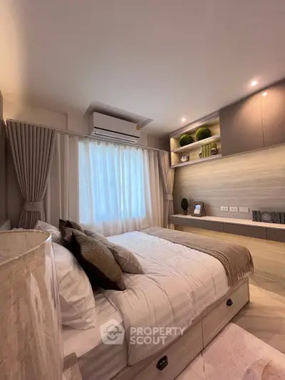 Cozy modern bedroom with stylish decor and natural light