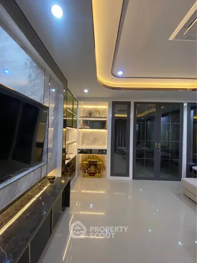 Luxurious modern living room with sleek design and ambient lighting