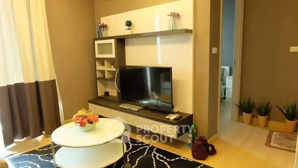 Modern living room with stylish TV unit and cozy decor