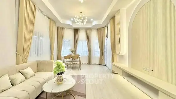 Luxurious living room with elegant decor and ample natural light