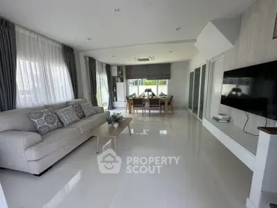 Spacious modern living room with elegant decor and natural light