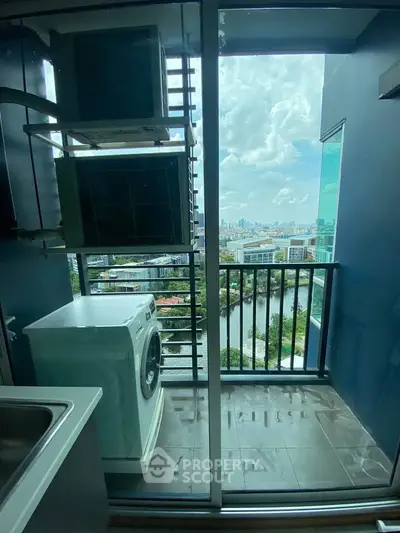 Modern balcony with washing machine and stunning city view