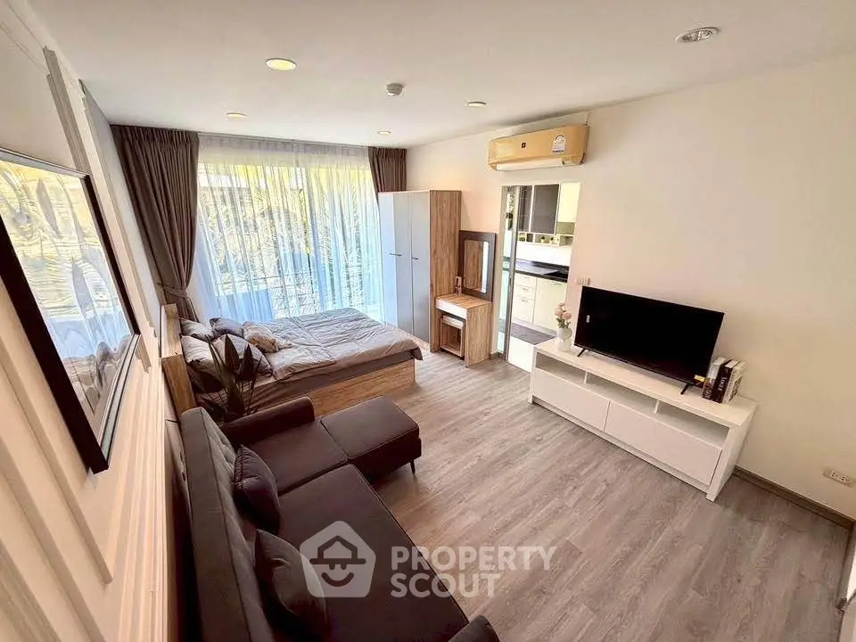 Modern studio apartment with stylish decor and natural light