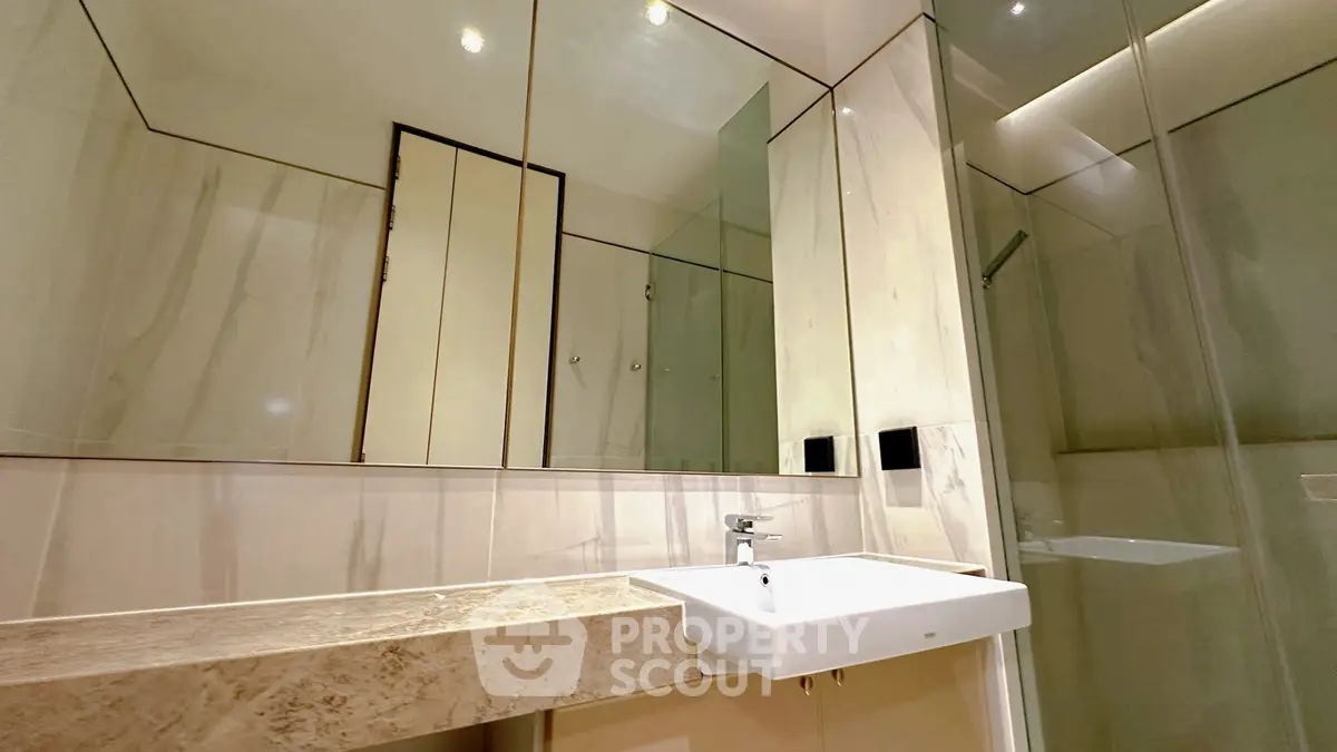 Modern bathroom with sleek design and marble countertop