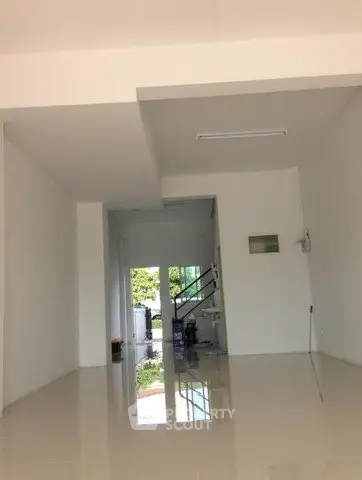 Spacious modern interior with glossy floors and natural light, ideal for customization.