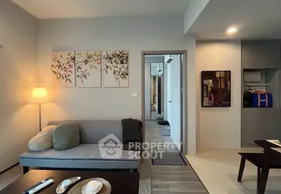 Modern living room with stylish decor and cozy ambiance.