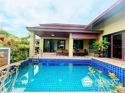 Luxurious villa with private pool and spacious patio, perfect for tropical living.