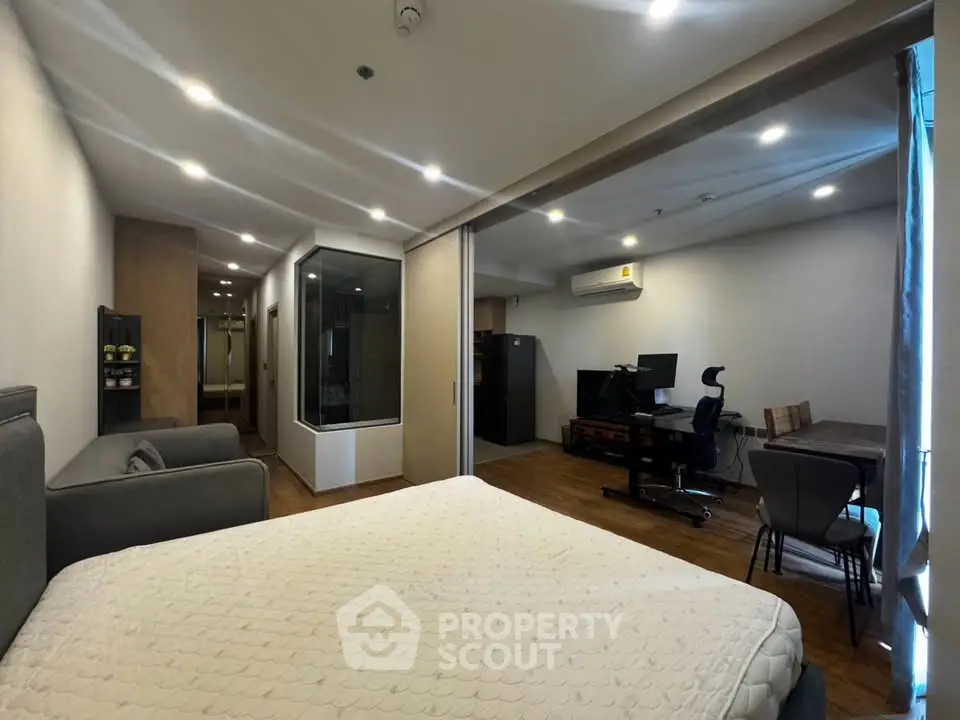 Spacious modern studio apartment with open layout and stylish furnishings