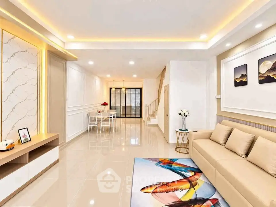 Spacious modern living room with elegant decor and open dining area