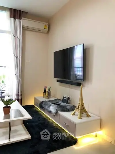 Modern living room with sleek TV setup and stylish decor