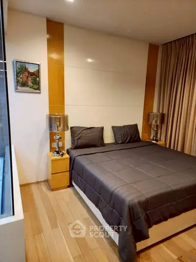 Modern bedroom with sleek design and elegant lighting