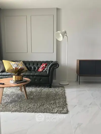 Stylish modern living room with chic leather sofa and elegant decor