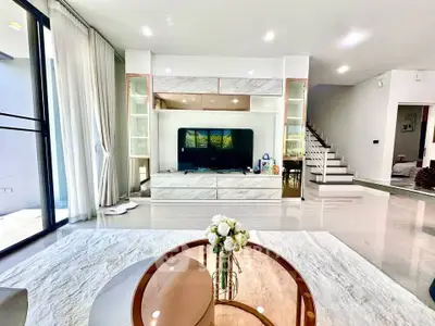 Luxurious modern living room with elegant decor and natural light