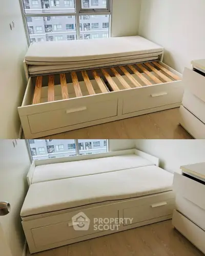 Compact bedroom with space-saving pull-out bed and storage drawers, ideal for modern urban living.