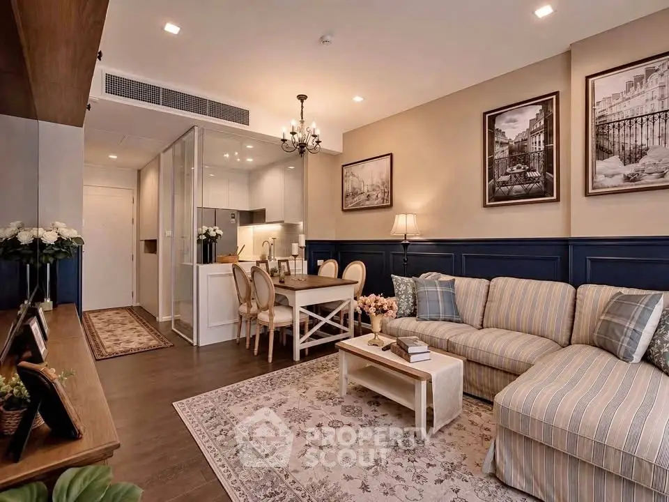 Charming living room with elegant decor and cozy seating in a modern apartment.