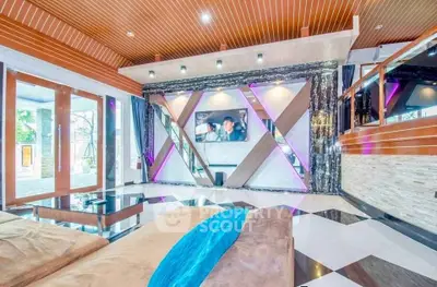 Luxurious modern living room with unique geometric wall design and vibrant lighting