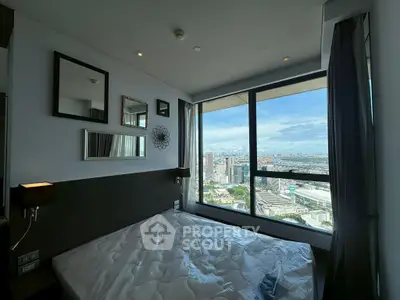 Modern bedroom with stunning city view and stylish decor