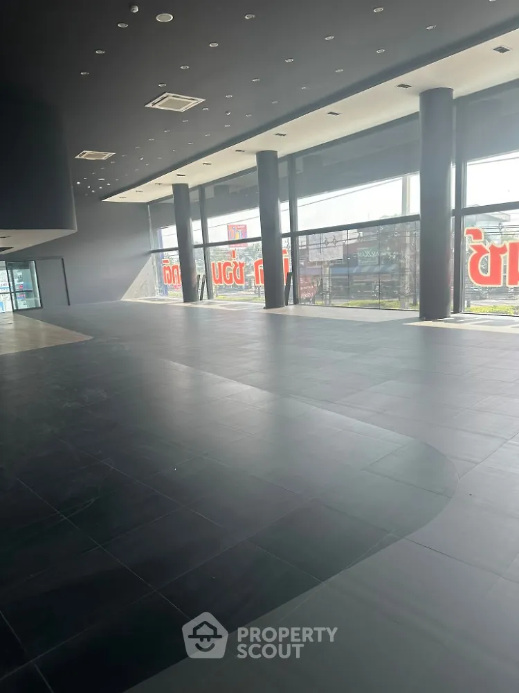 Spacious commercial property with large windows and modern design